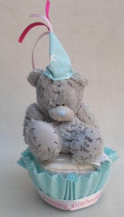 A TINY LITTLE TATTY TEDDY (ME TO YOU) ON A 'HAPPY BIRTHDAY' CUPCAKE!!