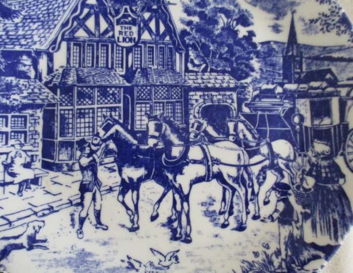 TWO CONSTANTIA FINE CHINA PLATES - THE RED LION - ONE BLUE AND WHITE AND ONE BROWN AND WHITE