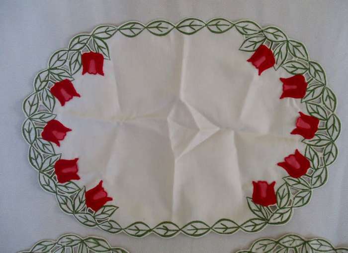 A set of five cloths - appliqued and embroidered with pretty Dutch tulips