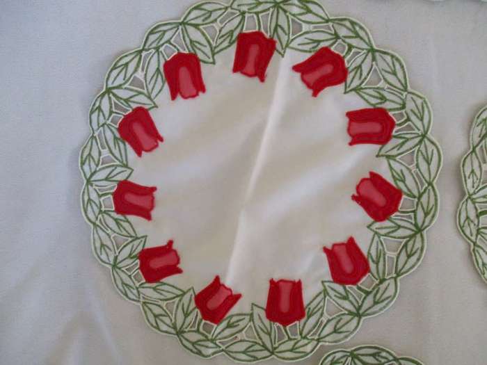 A set of five cloths - appliqued and embroidered with pretty Dutch tulips