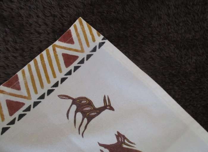 A pretty African themed tray cloth