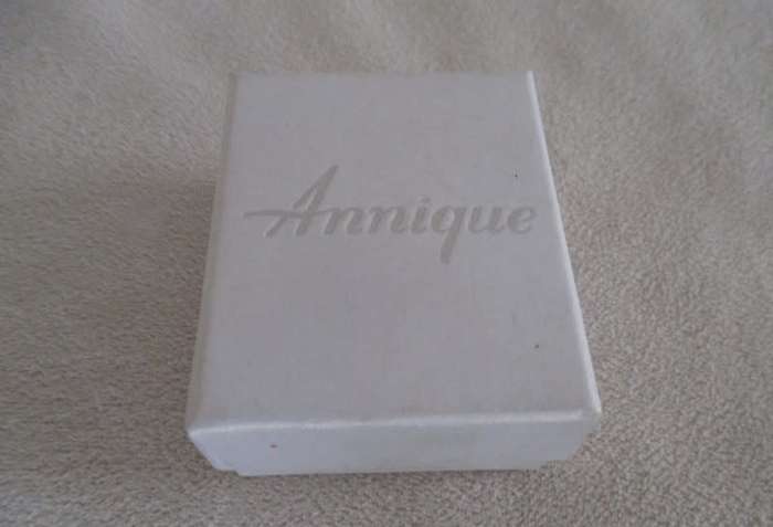 A pair of pretty Annique enamelled clip on earrings in original box