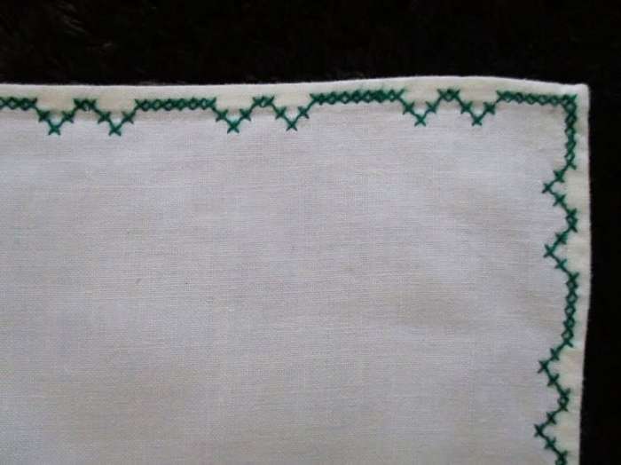 Rather different - an embroidered cross stitch runner with pretty roses