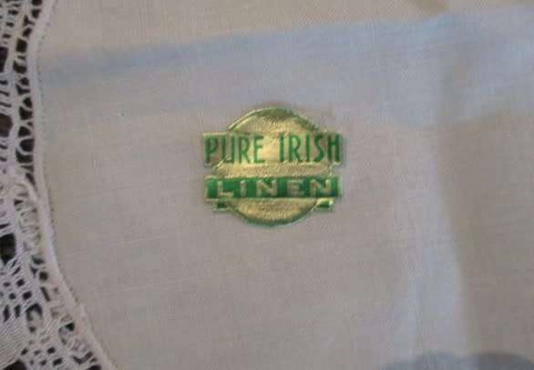 Quality Pure Irish Linen embroidered oval cloth with crocheted lace border