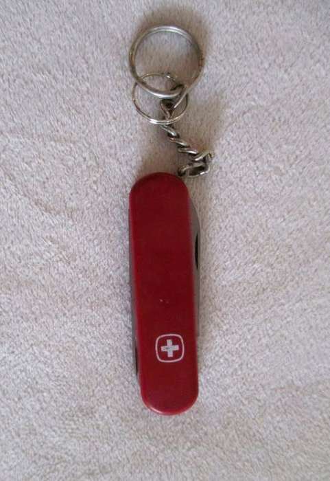 Three small vintage Victorinox Swiss Army Knives