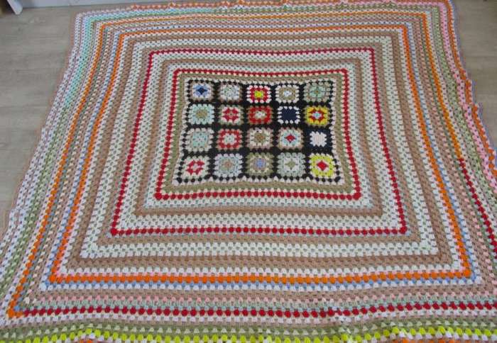 A hand crocheted wool blanket with soft colours - 190cm x 176cm