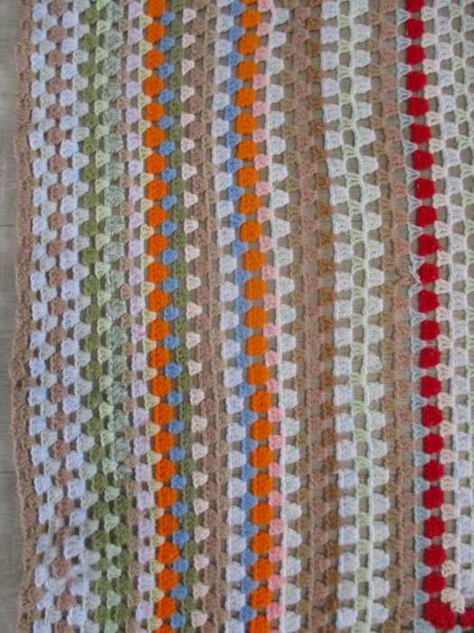 A hand crocheted wool blanket with soft colours - 190cm x 176cm