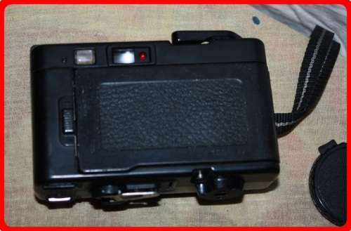 VINTAGE KONICA POP CAMERA WITH CASE AND LENSE COVER  SOLD AS IS