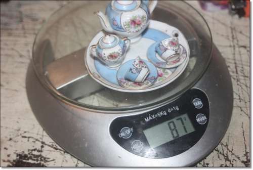 MINIATURE PORCELAIN TEA SERVICE ON TRAY NOT STAMPED