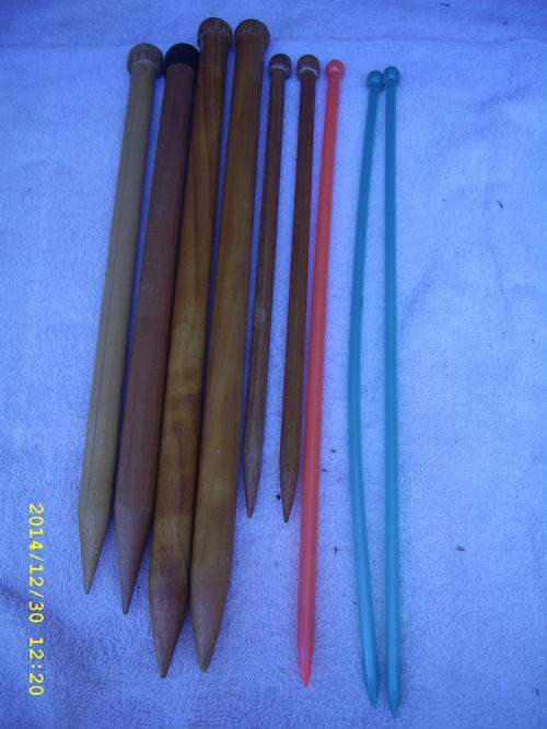 Bundle of oversized knitting needles on auction