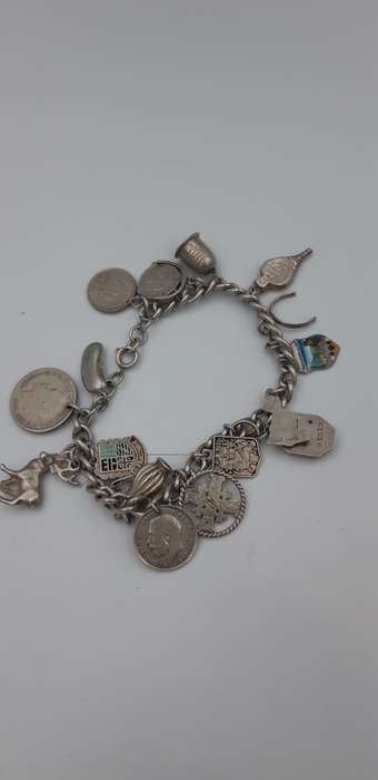 Charm Bracelet 92.5 silver with  17 charms
