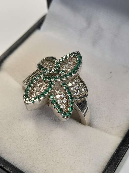 Sterling silver ladies ring Size: O.5 NO BOX