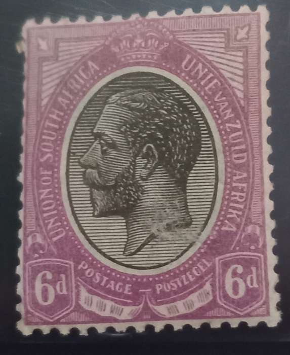 Union of SA 6d Kings Head with clear smudging of ink and black dot infront of kings nose