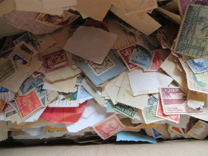 Glory Box of World Stamps on and off Paper - Must be treasure here!