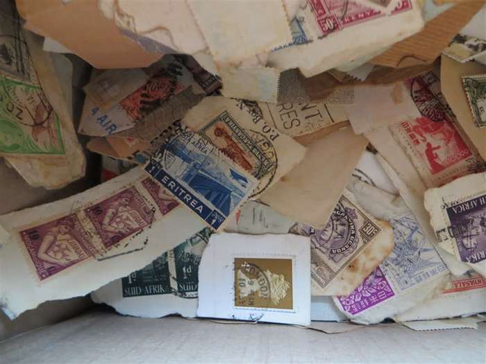 Glory Box of World Stamps on and off Paper - Must be treasure here!