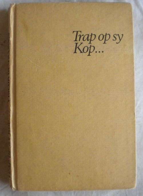 Trap op sy kop deur Frieda de Villiers