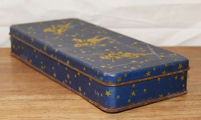 Vintage Tin with Musical Puttis and Stars