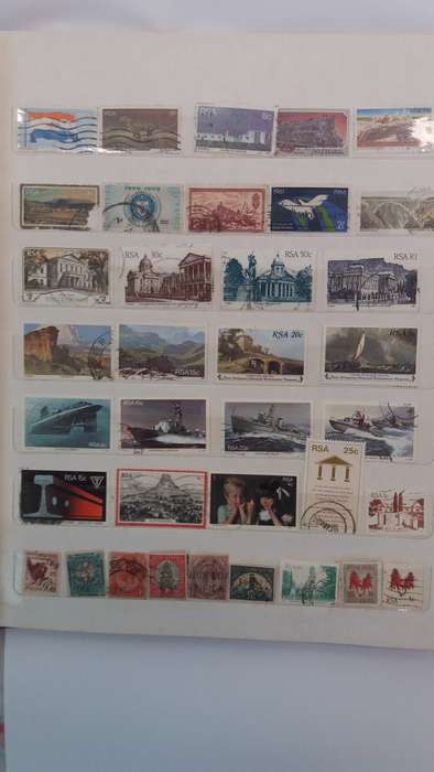 + 621 World Stamps from 1960s including RSA in Vintage Flying Eagle Album 16 Pages * 32x26x2*