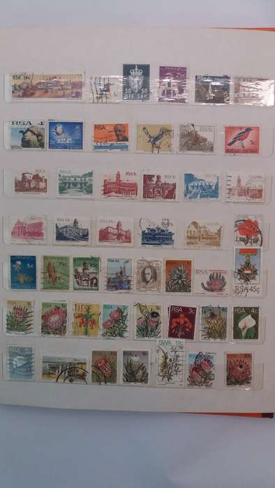 + 621 World Stamps from 1960s including RSA in Vintage Flying Eagle Album 16 Pages * 32x26x2*