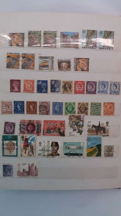 + 621 World Stamps from 1960s including RSA in Vintage Flying Eagle Album 16 Pages * 32x26x2*