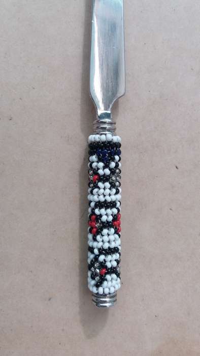 Hand-beaded curled cheese Knife - Silver Plated