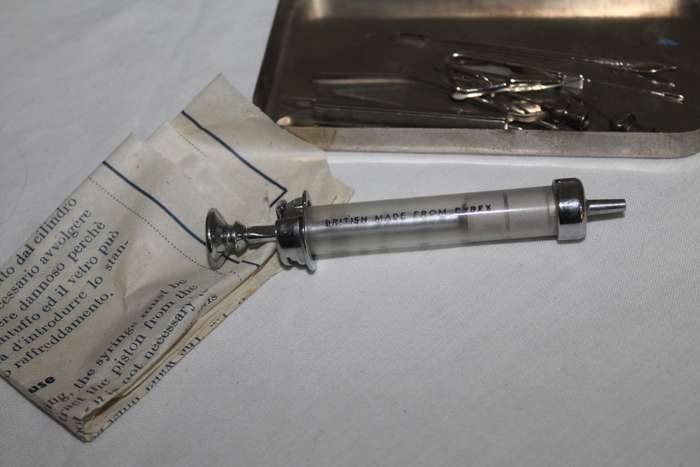 Glass Syringe in metal box