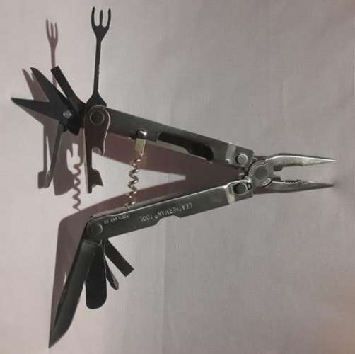 Discontinued Leatherman Flair with Nylon Pouch Good Condition