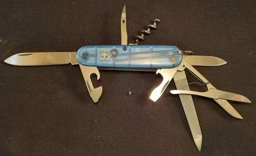Victorinox - Mountaineer with Blue Translucent Scales Older model with grooved corkscrew