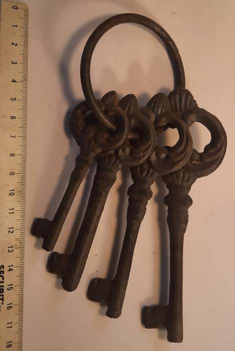 Set of  four decorative Metal  Keys on ring