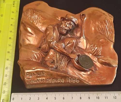 Copper Plated wall mural Gold Panner Johannesurg with gold reef city coin in pan
