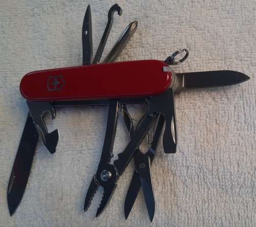 Victorinox Deluxe Tinker- red  Scales tools as per pictures