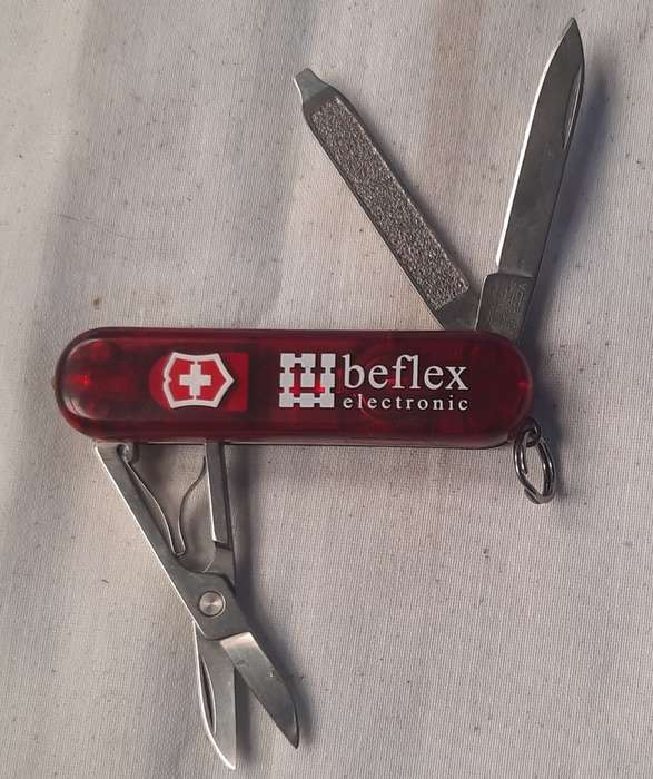 Victorinox Swiss Army Knife - Classic sd Red Translucent Scales with red led light with beflex logo