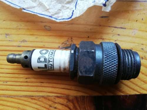 VINTAGE USED ALDOR SPARK PLUG IN BOX.  With original wax proof paper wrapper