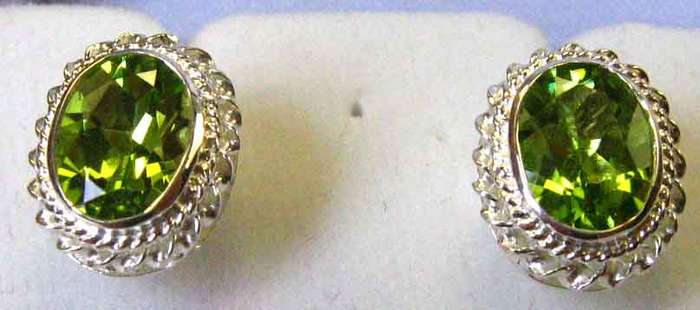 A pair of Sterling Silver and Genuine Peridots Earrings