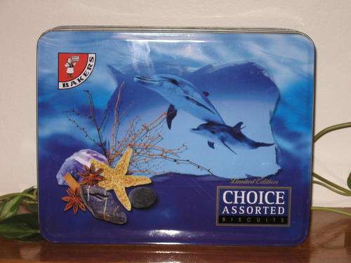 Beautiful Biscuit Tin with magnifenct underwater sea-nery of Dolphins etc.
