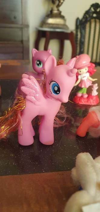 Two Small My Little Pony Toys plus a few extras