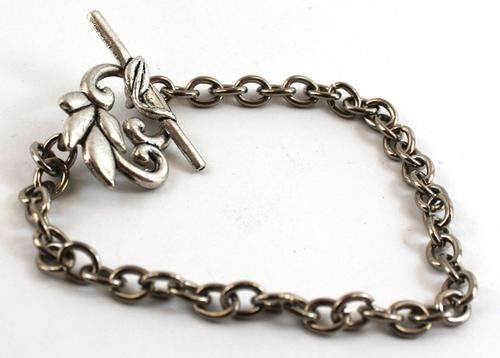 Silver Coloured Bracelet with Leaf Clasp