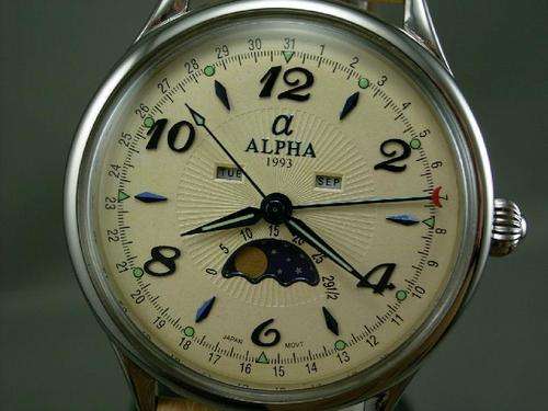 Alpha multifunction (ceramic ivory dial) calendar watch with moon phase, date, day of week, month