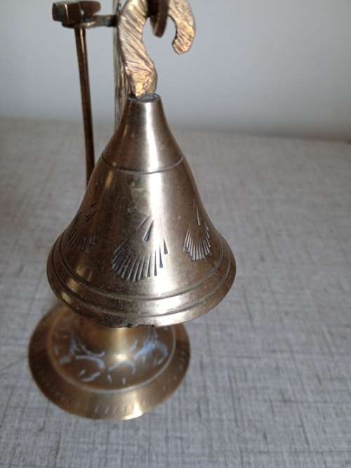 Stunning brass dinner bell