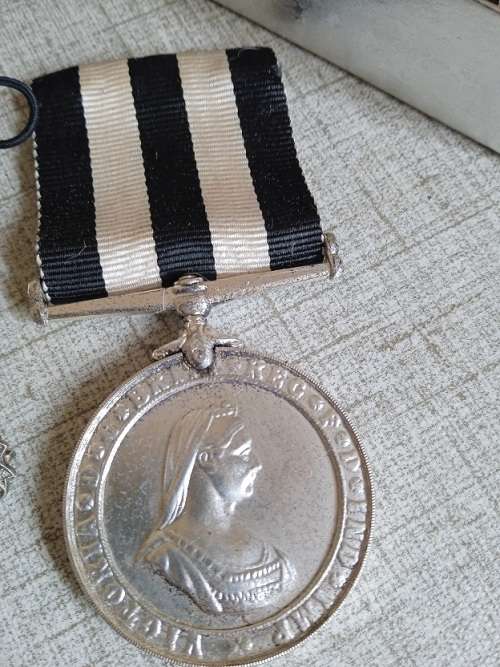 St Johns Victoria Brit long service medal and some st Johns badges and pins