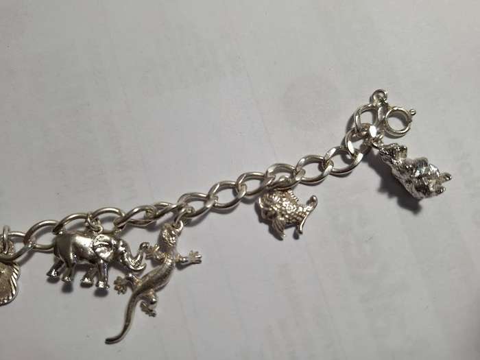 Stunning silver charm bracelet 35.2gr