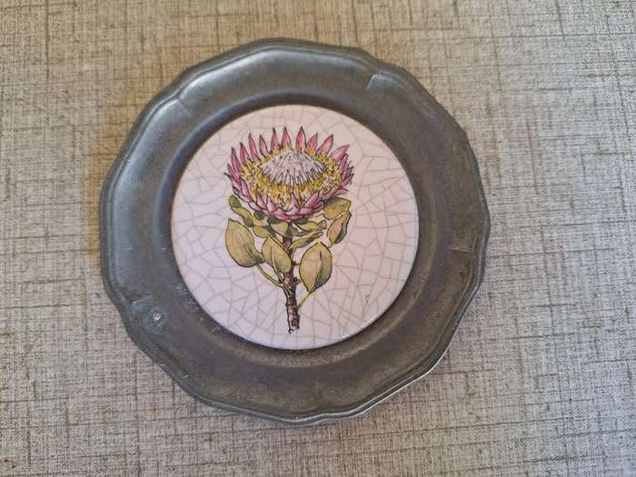 Small pewter???? and tile wall plate