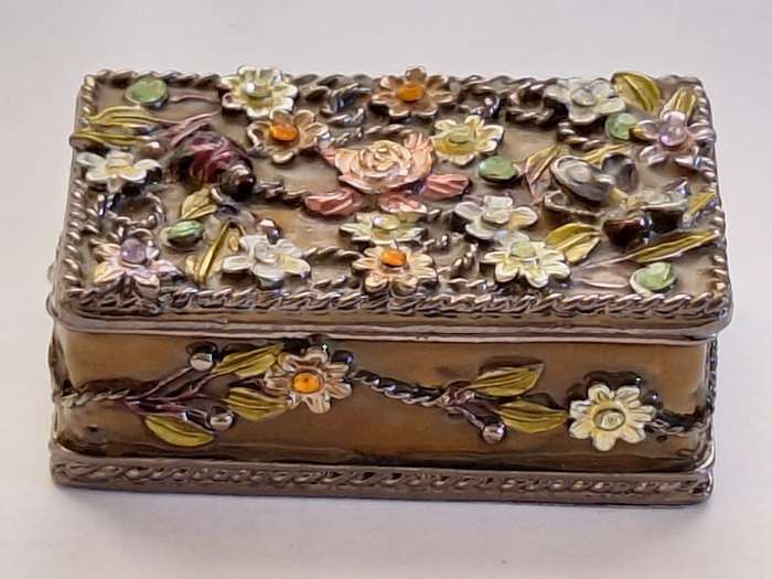 Enamel inside and stunning metal flowers on outside, trinket holder, heavy
