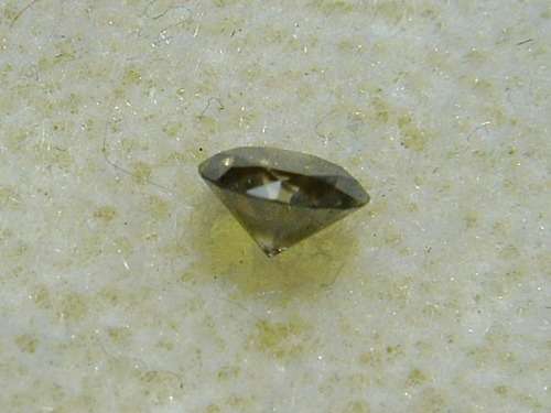 Fancy Dark Brownish Green Round Diamond 0.21 ct.