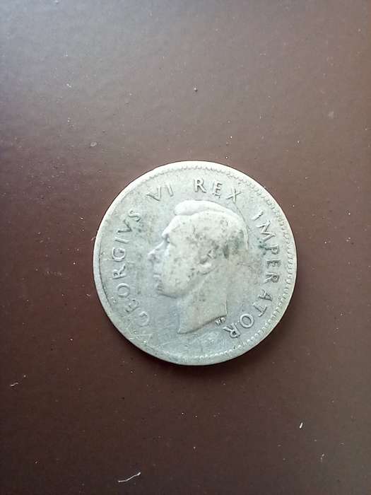 LOT OF 4 SILVER 80% WELL CIRCULATED THREE PENCE COINS. ONE BID TAKES ALL.