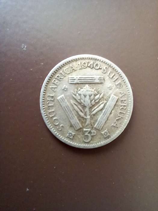 LOT OF 4 SILVER 80% WELL CIRCULATED THREE PENCE COINS. ONE BID TAKES ALL.