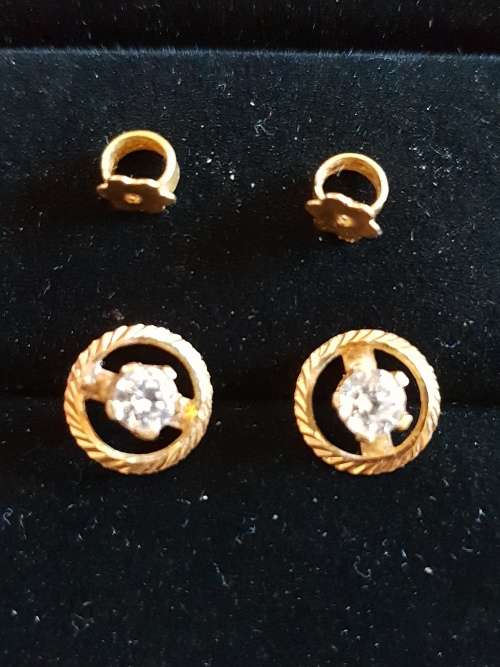 Genuine 18ct gold earrings with halo loop around Cubic Zirconia`s