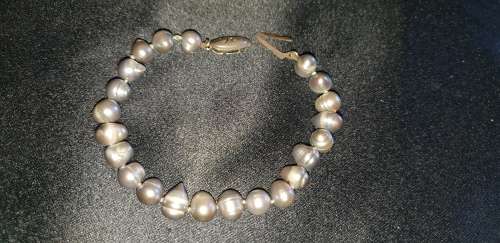 Genuine Fresh water black pearl bracelet with a Sterling silver clasp