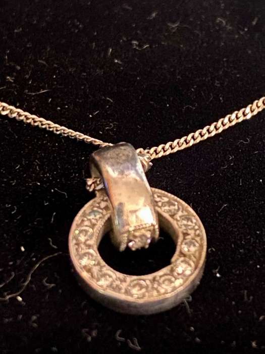 9ct white gold chain with a 9ct white gold and diamond Halo pendant