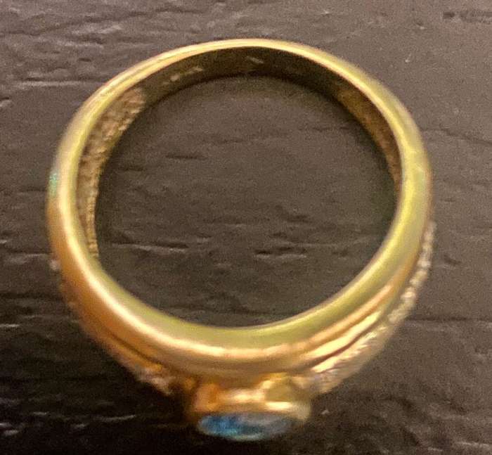 Diamond and Blue Oval Topaz Ring set in 9ct yellow gold
